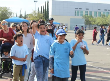 ES Students Happy - A World Fit For Kids!